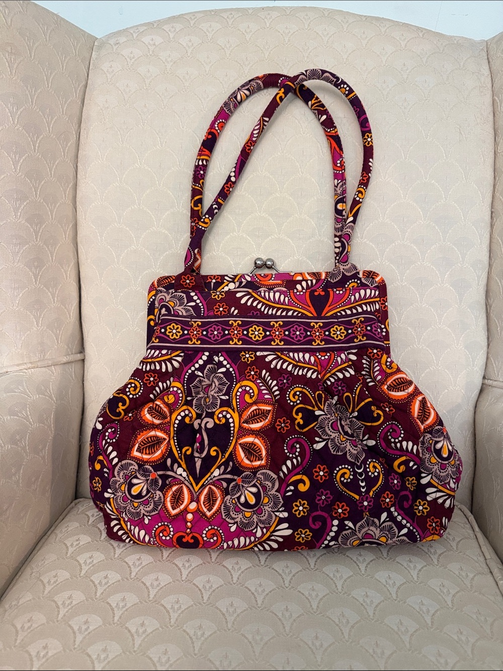 Burgundy Floral Patterned quilted Handbag with kiss lock closure